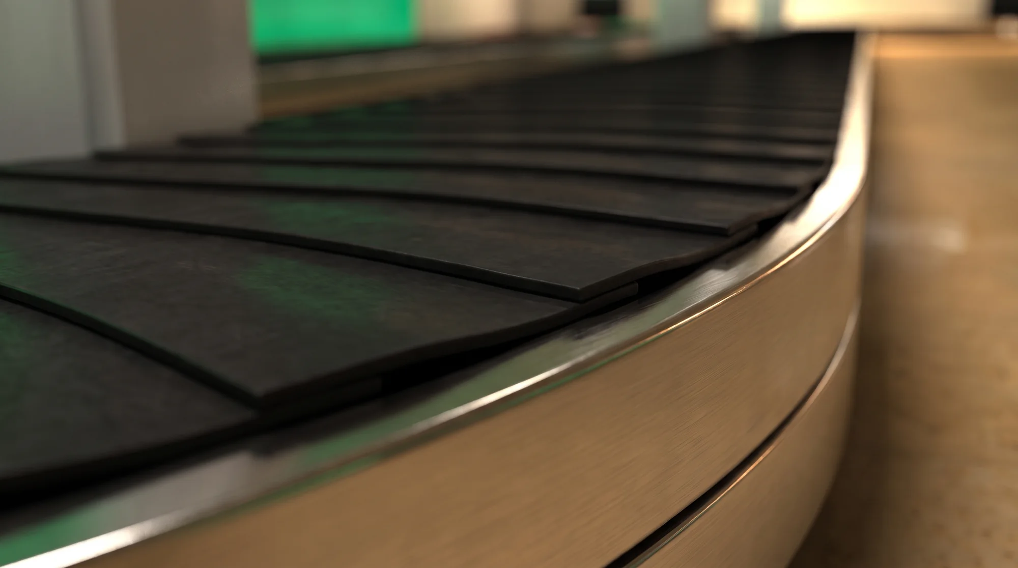 Detail of the carousel: overlapping black slats and the brushed steel rim