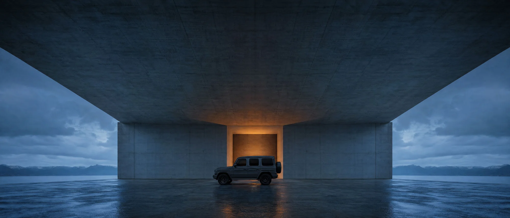 G-Class side view under a concrete cantilever structure at dusk, warm glow inside the opening